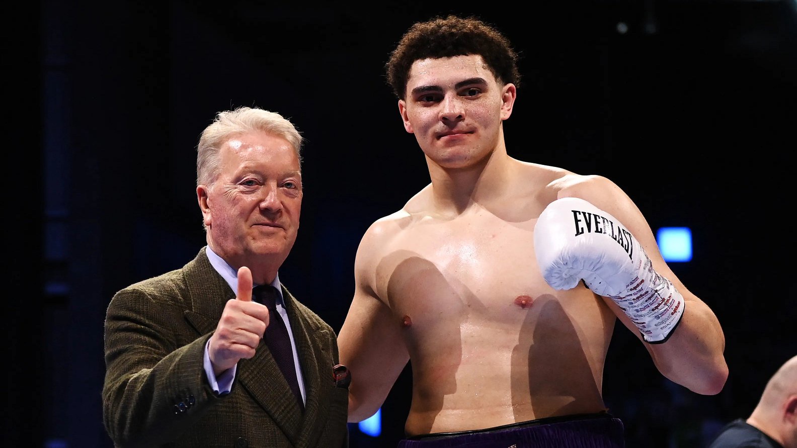 Adam Olaniyan next to promoter Frank Warren