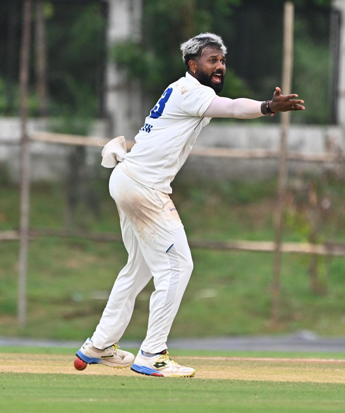 Andhra's Lalith Kumar celebrates the wicket of Hyderabad's Milind Anand on the 1st day of their Ranji Trophy match at the ACA Stadium in Mulapadu, on Sunday, October 18, 2026.