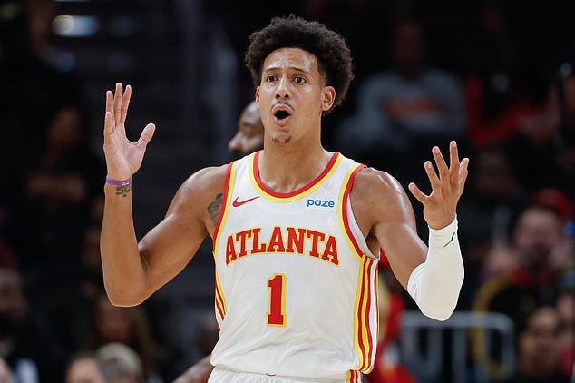 Atlanta Hawks forward Jalen Johnson reacts after being called for traveling during the first half of an NBA basketball game against the Cleveland Cavaliers, Thursday, Oct. 29, 2026, in Atlanta. (AP Photo/Erik S. Lesser)