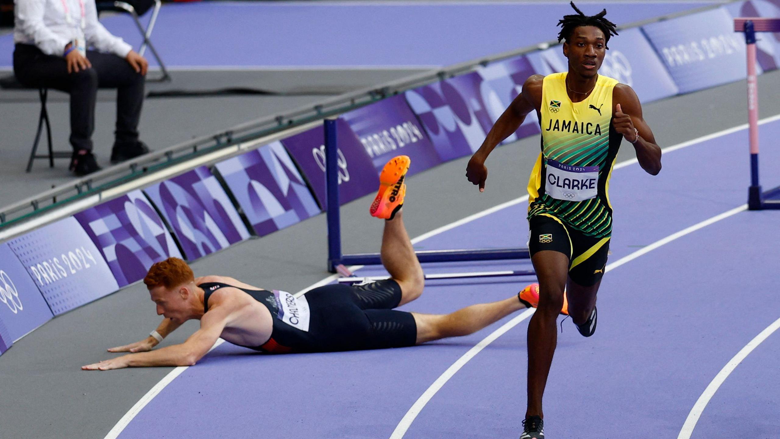 Alastair Chalmers lands on the floor at the last Olympic Games after hitting a hurdle in the semi-finals