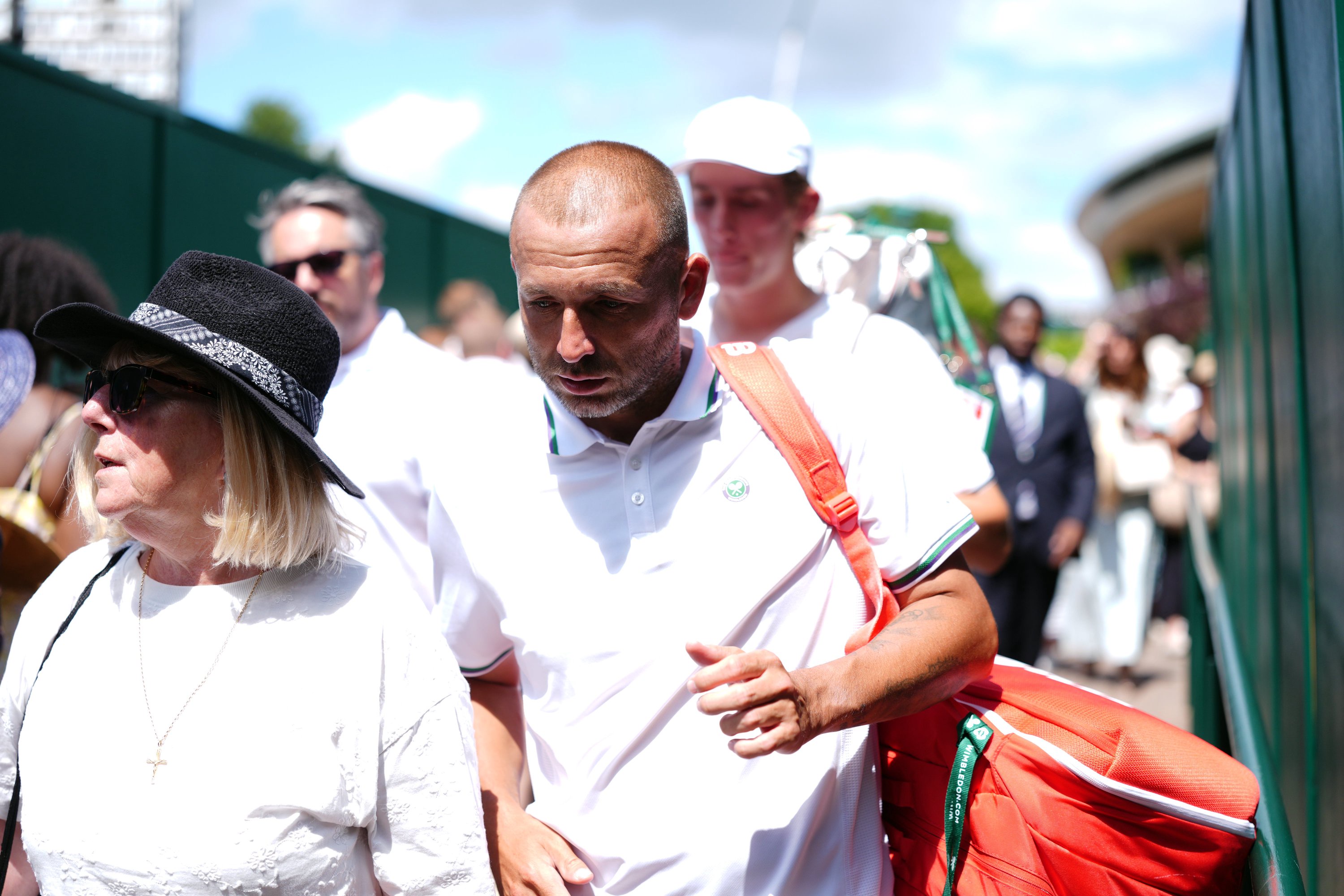 Dan Evans ended his professional career with a first-round defeat in Wimbledon doubles