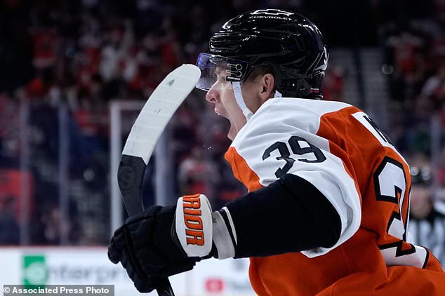 Philadelphia Flyers' Matvei Michkov celebrates after scoring a goal during the second period of an NHL hockey game against the Colorado Avalanche Monday, Oct. 19, 2026, in Philadelphia. (AP Photo/Matt Slocum)