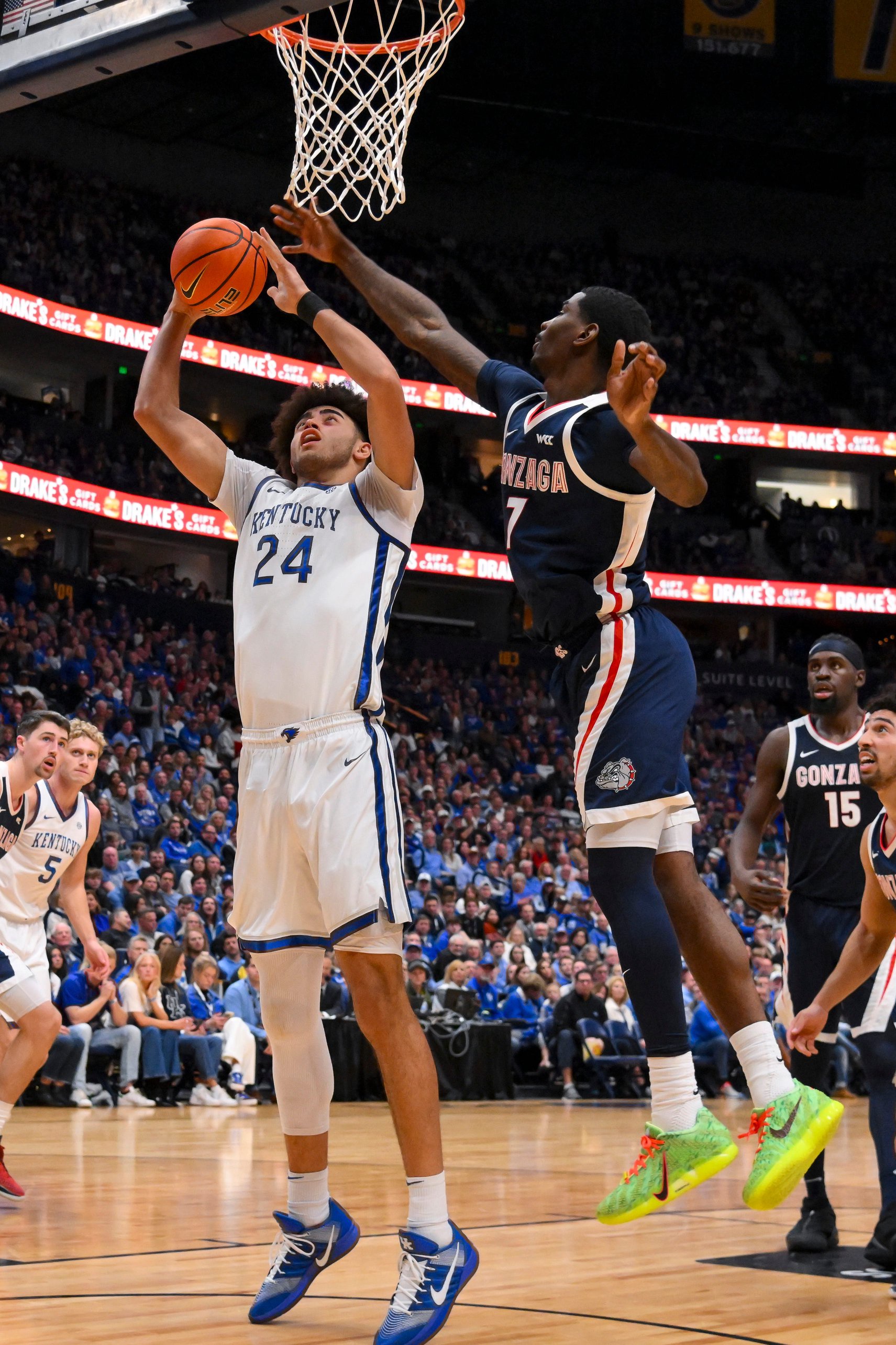 Dec 5, 2025; Nashville, TN, USA; Gonzaga Bulldogs guard Tyon Grant-Foster (7) blocks the shot of Kentucky Wildcats center Malachi Moreno (24) during the first half at Bridgestone Arena. Mandatory Credit: Steve Roberts-Imagn Images