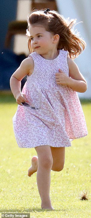 Princess Charlotte is pictured in June 2018 at the Maserati Royal Charity Polo Trophy at the Beaufort Polo Club