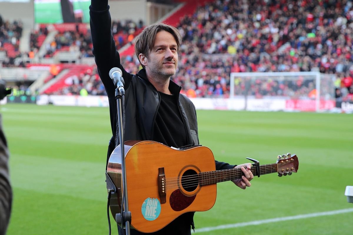Alistair Griffin performs his song We Shall Be at the Riverside