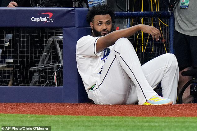 Tampa Bay Rays third baseman Junior Caminero watches from the dugout on Monday