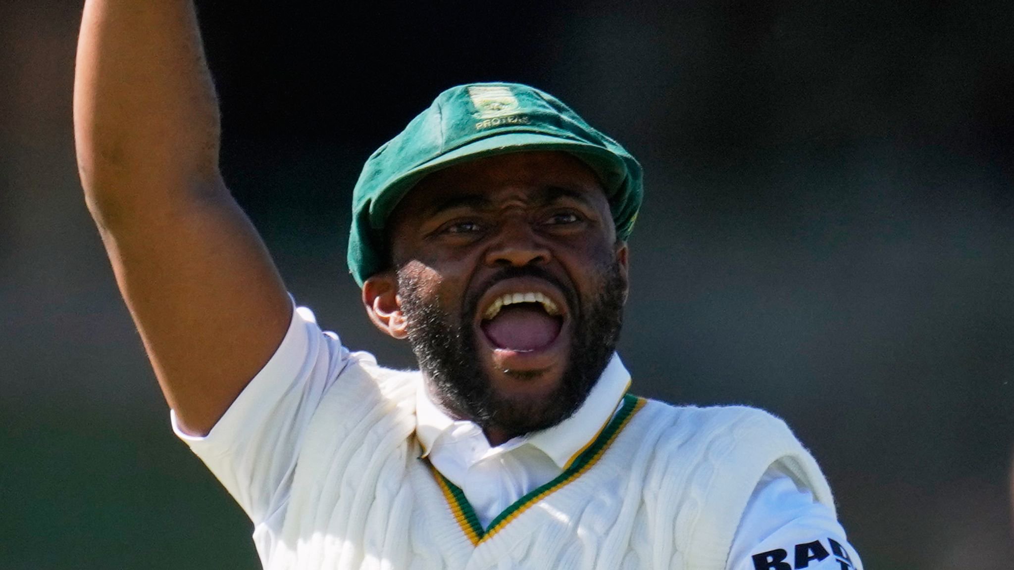 South Africa's captain Temba Bavuma celebrates as team-mate Wiaan Mulder bowled Australia's Scott Boland