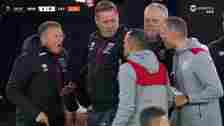 West Ham 's assistant manager Billy McKinlay (left) was sent off after furiously clashing with Bayer Leverkusen coaching staff, who also had a member of their team shown a red card