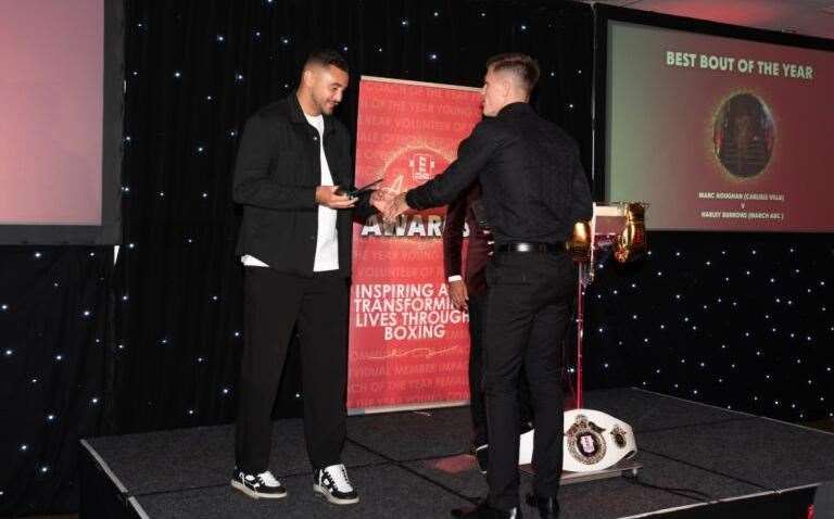 Being presented with the bout of the year