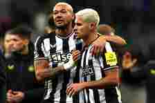 Joelinton of Newcastle United celebrates with teammate Bruno Guimaraes following the team's victory during the Premier League match between Newcast...