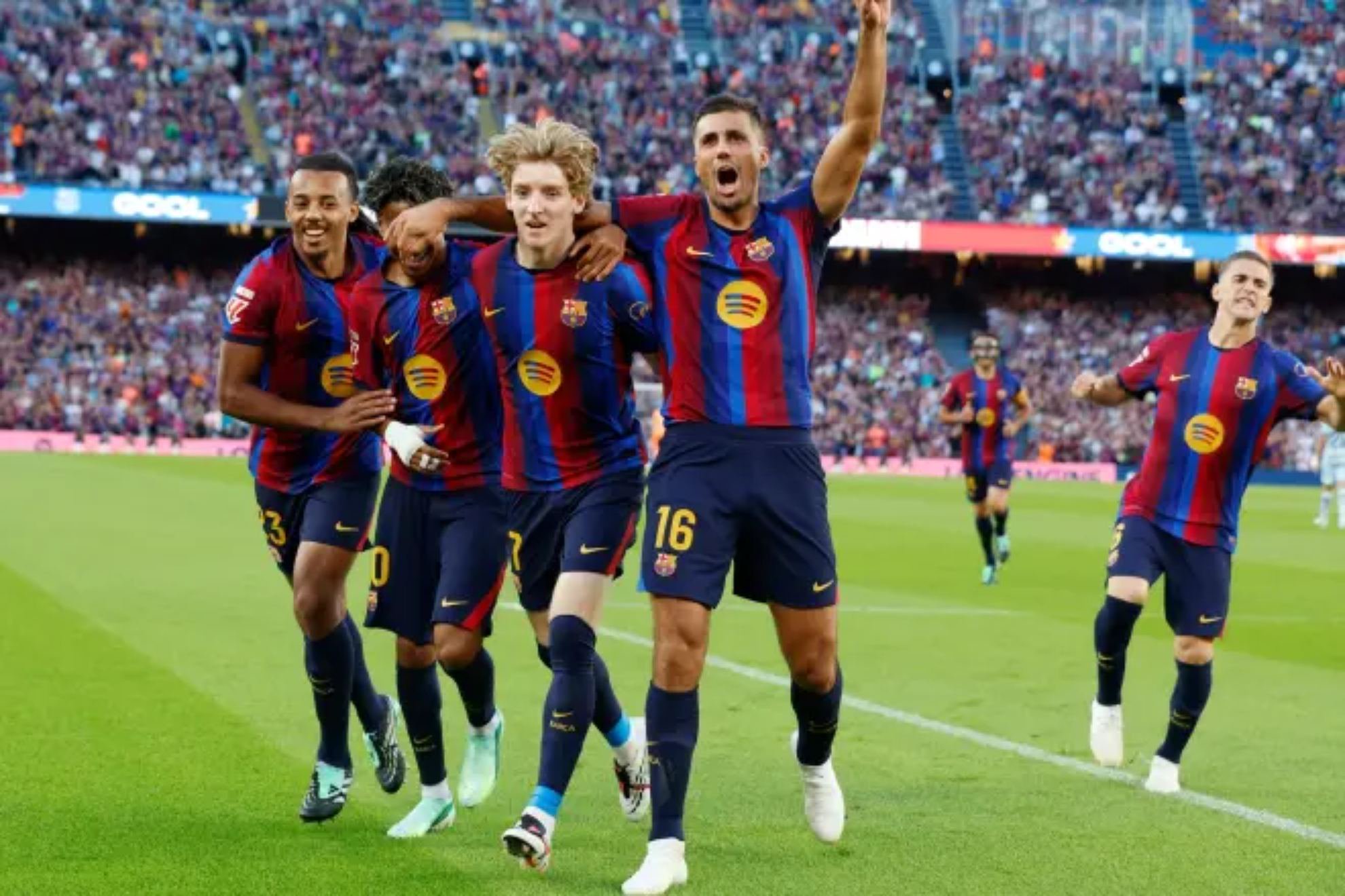 Barcelona players celebrate a goal