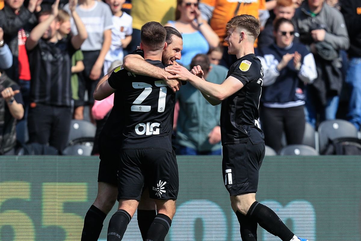 Lewie Coyle celebrates with Keane Lewis-Potter