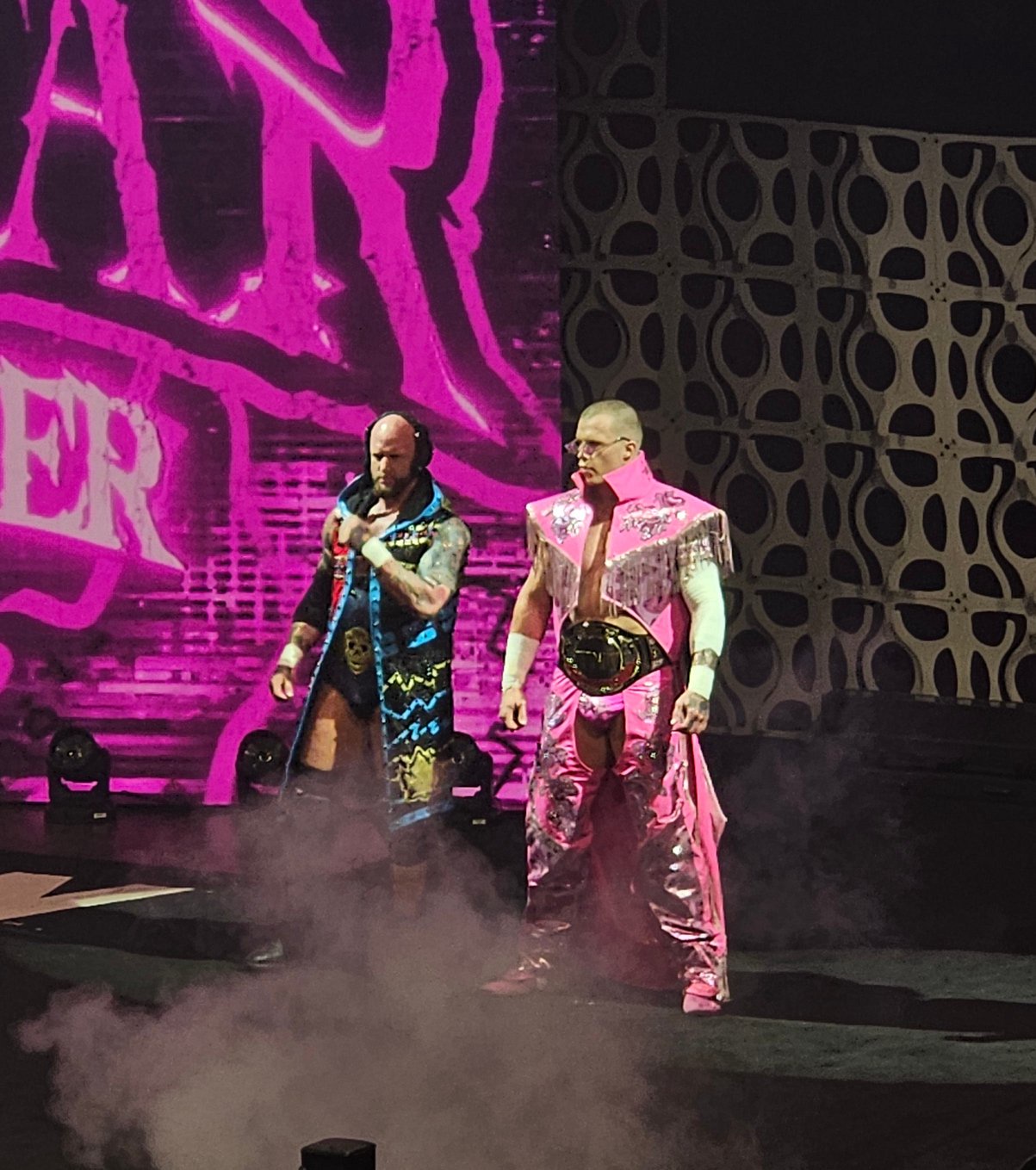 Kyle Fletcher, right, makes his entrance with Josh Alexander at a 2025 AEW show in Cincinnati, OH.
