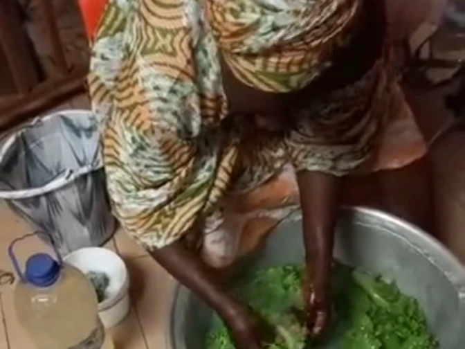 This is sad: Woman washes vegetables she is selling to the public with soap.