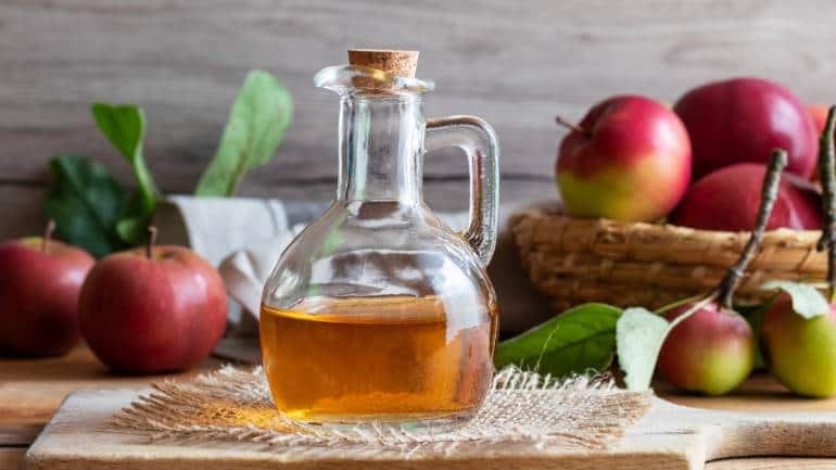 Apple cider vinegar: Vinegar, particularly apple cider vinegar, has mild exfoliating properties that can help remove dead skin cells from your heels. It also has antibacterial properties that can help prevent infection in cracked skin (Image: Canva)