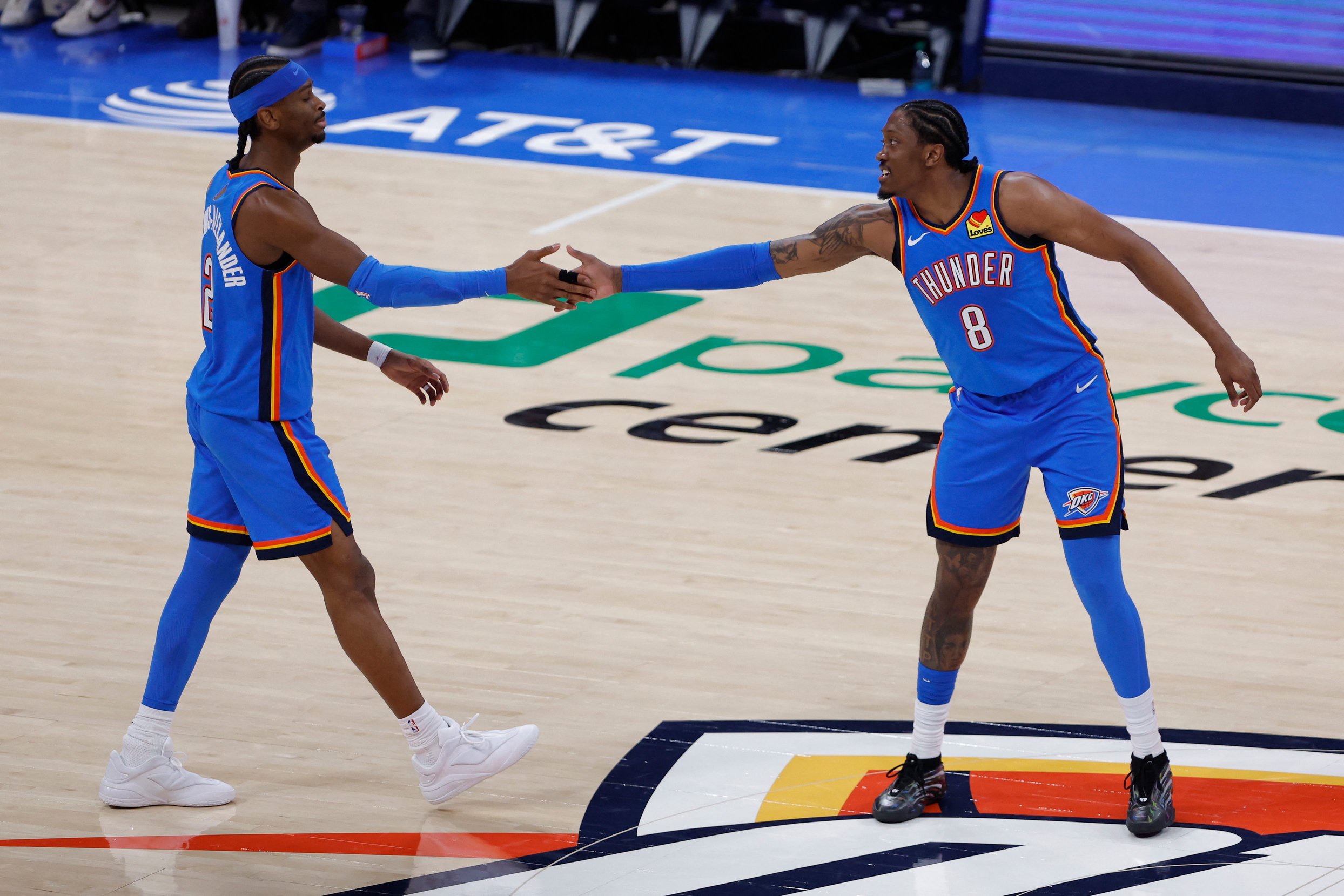 Oklahoma City Thunder guard/forward Jalen Williams (8) celebrates with guard Shai Gilgeous-Alexander (2) after he scored against the San Antonio Spurs during the second half at Paycom Center. 