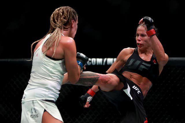 Liz Carmouche of the United States (right) fights against Katlyn Chookagian of the United States at UFC 205