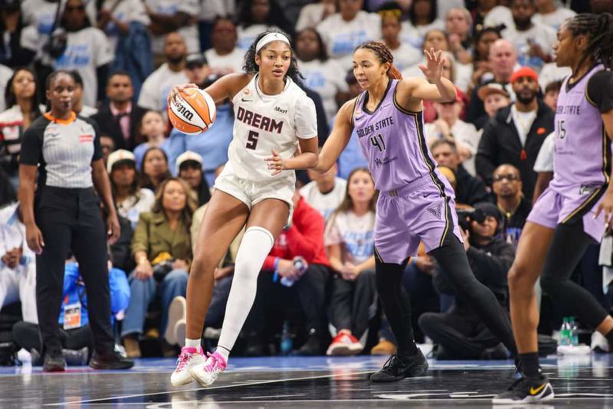Oct 24, 2026; Atlanta, Georgia, USA; Atlanta Dream forward Angel Reese (5) is defended by Golden State Valkyries center Kiah Stokes (41) in the fourth quarter during game four of the 2026 WNBA Finals at State Farm Arena. © Brett Davis-Imagn Images