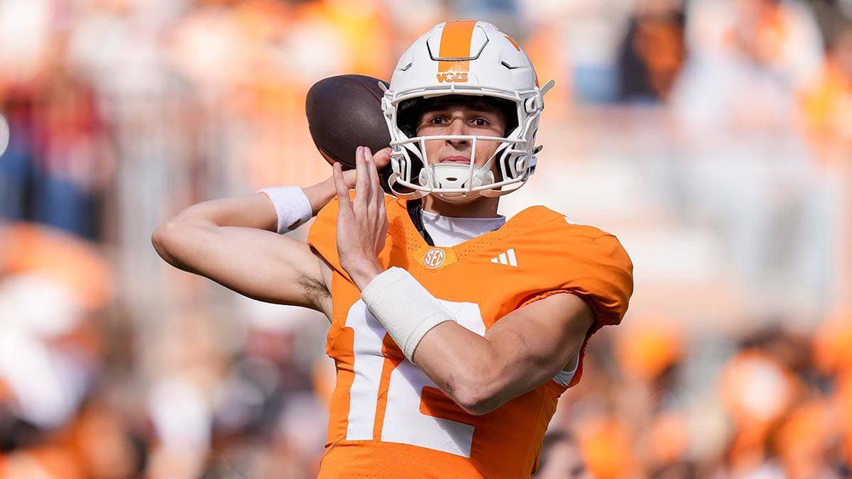 George MacIntyre warms up before a game at Neyland Stadium