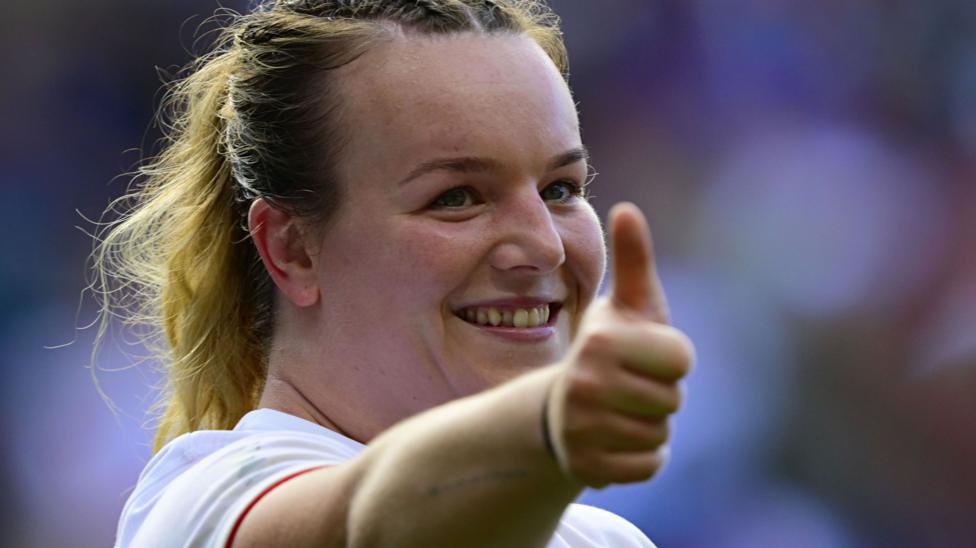 Lark Atkin-Davies puts her thumbs up