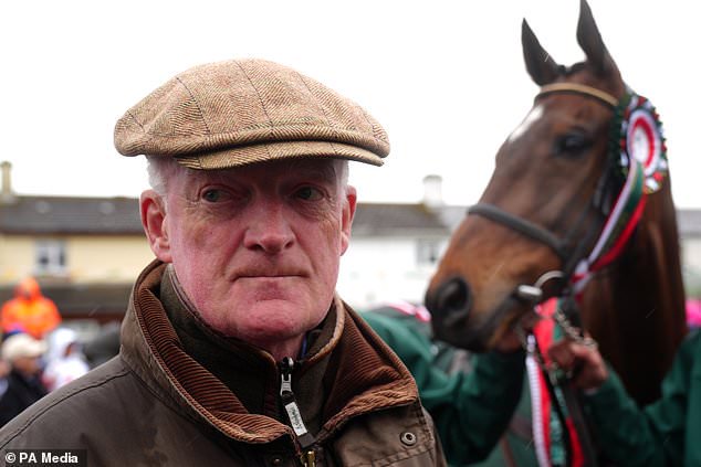 Trainer Willie Mullins and two-time Grand National winner I Am Maximus (Brian Lawless/PA)