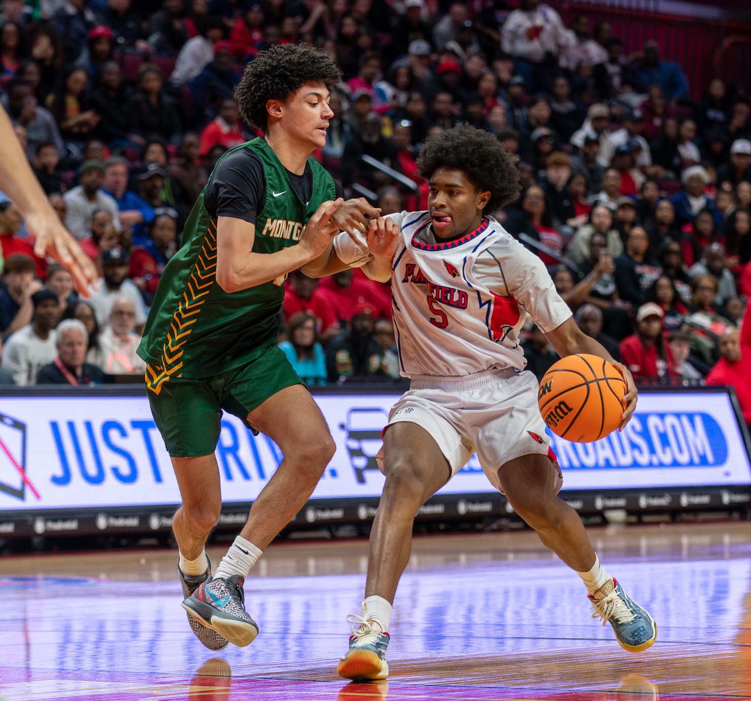 Plainfield's Micah Gordon (5) runs the ball against Montgomery in the boys basketball Group 4 state final on March 14, 2026 at Jersey Mike's Arena in Piscataway.