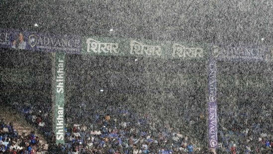 The rain then returned in Bengaluru, as the match was called off after the cut-off time of 10.21 pm passed. (AP Photo/Aijaz Rahi)
