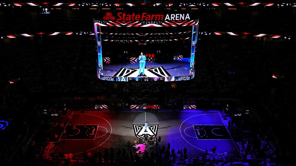 Crystal Renee Hayslett performs the national anthem at State Farm Arena.