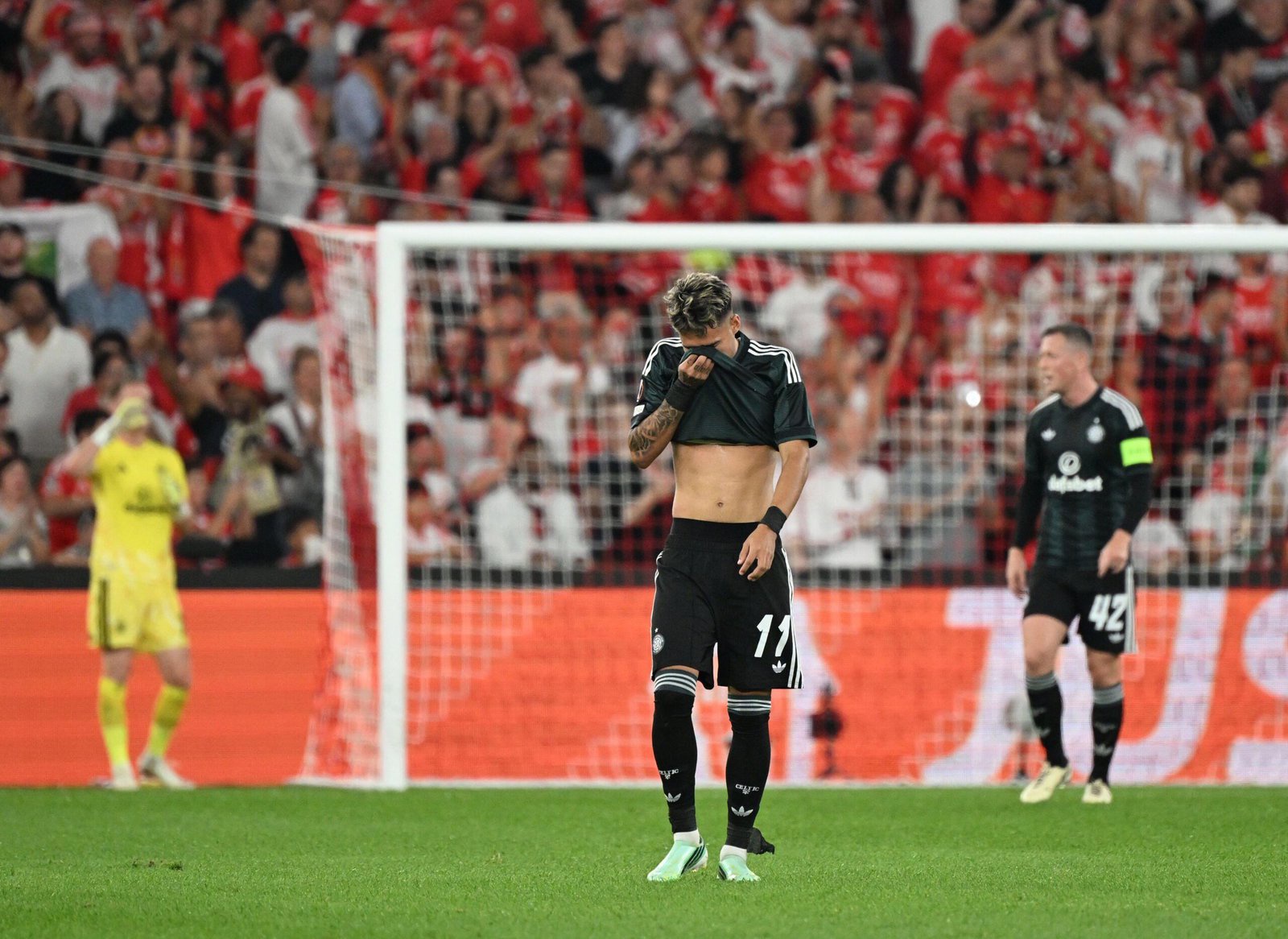 Celtic players dejected after Benfica's second goal in the Europa League match at the Estadio da Luz