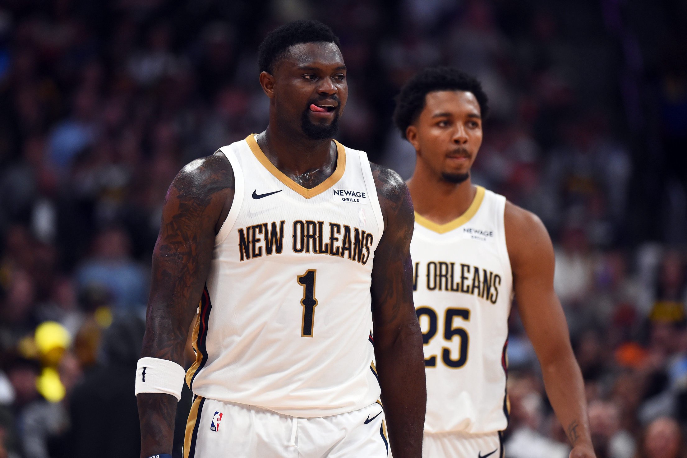 Oct 24, 2026; Denver, Colorado, USA; New Orleans Pelicans forward Zion Williamson (1) and New Orleans Pelicans forward Trey Murphy III (25) walk onto the floor after a timeout during the second half against the Denver Nuggets at Ball Arena. Mandatory Credit: Christopher Hanewinckel-Imagn Images