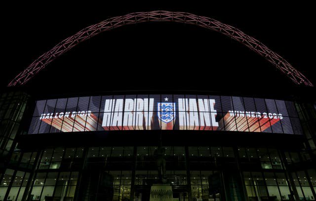 Wembley Stadium’s arch was illuminated in gold to honour Kane’s triumph