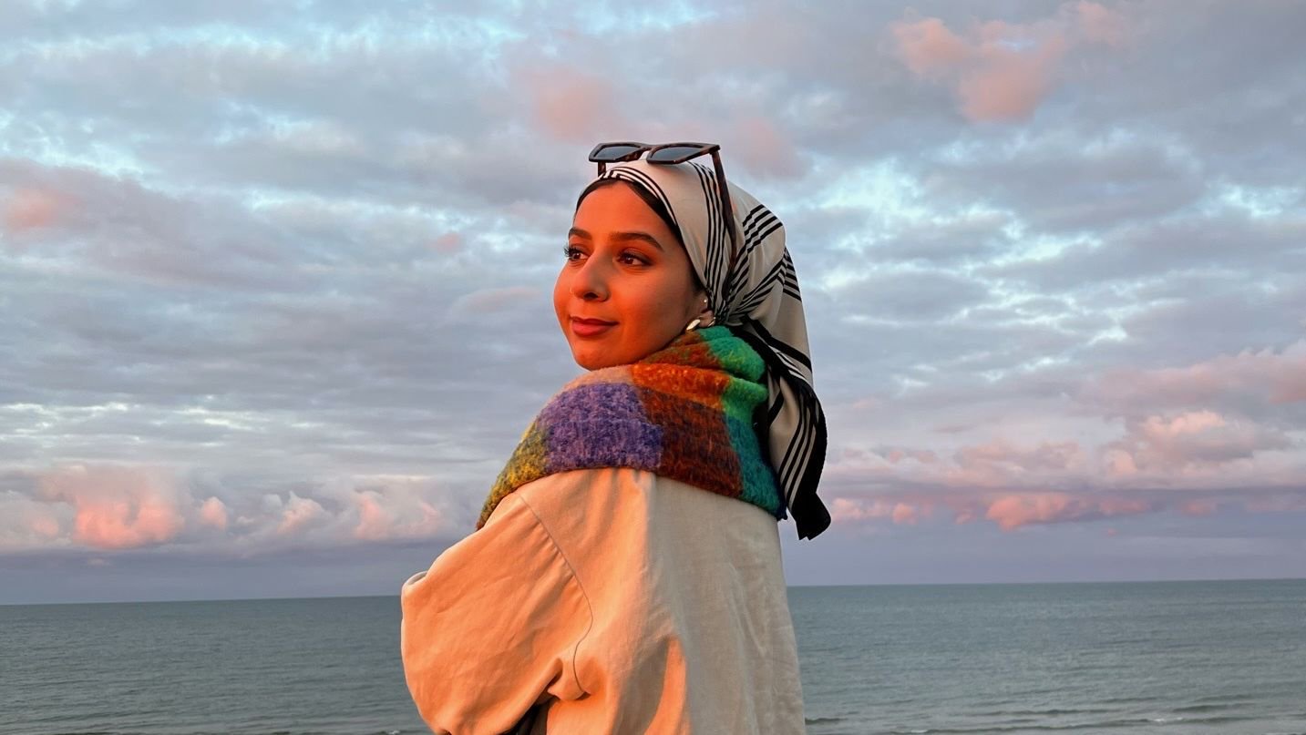 a person standing on a beach