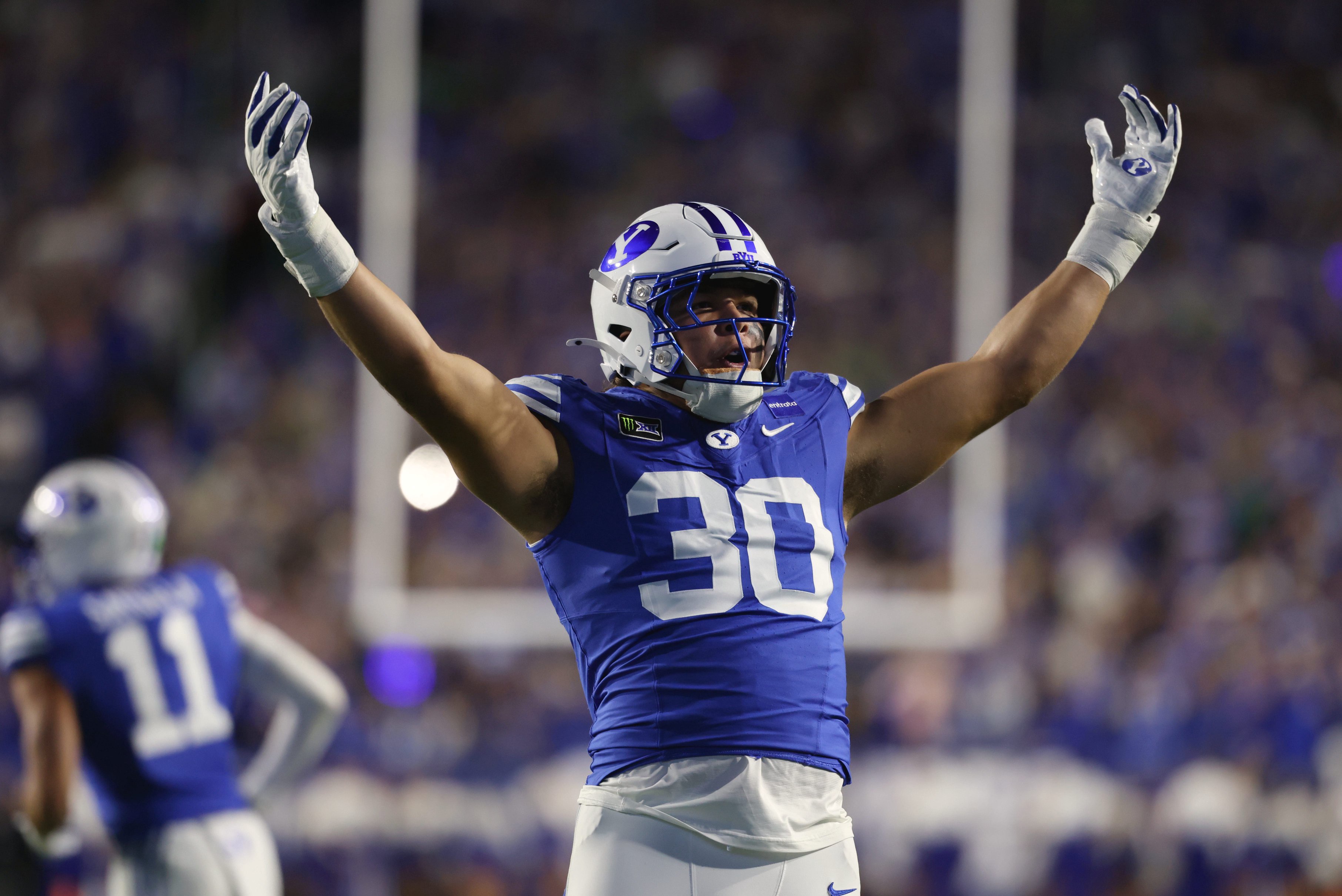 Oct 17, 2026; Provo, Utah, USA;  Brigham Young Cougars defensive end Braxton Lindsey (30) celebrates after a play during the second half against the Notre Dame Fighting Irish at LaVell Edwards Stadium.  Mandatory Credit: Rob Gray-Imagn Images