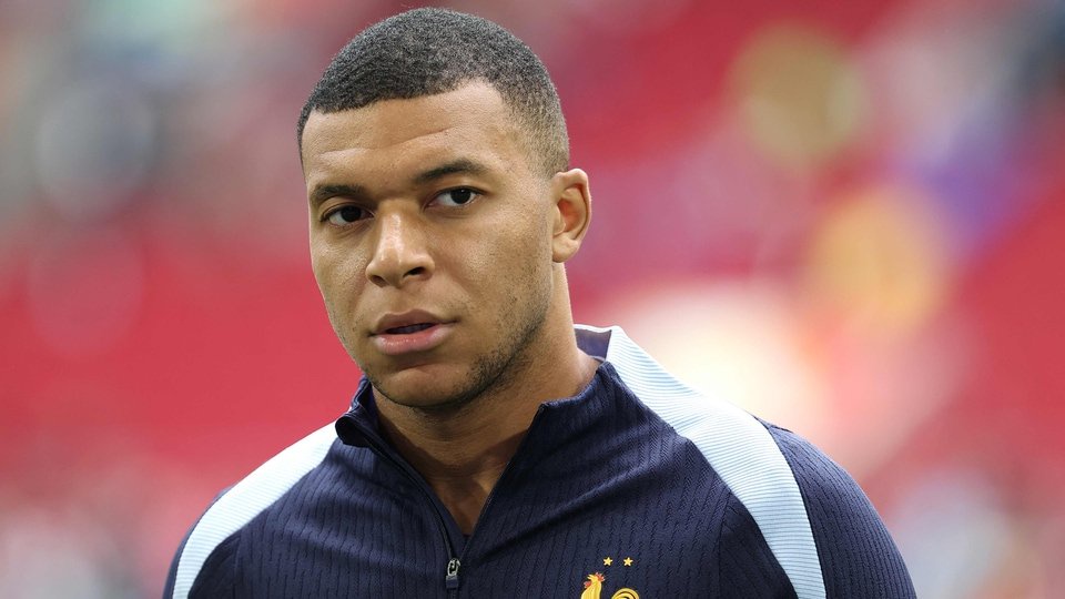 France's forward #10 Kylian Mbappe looks on ahead of the UEFA Euro 2024 round of 16 football match between France and Belgium at the Duesseldorf Arena in Duesseldorf on July 1, 2024 (AFP)