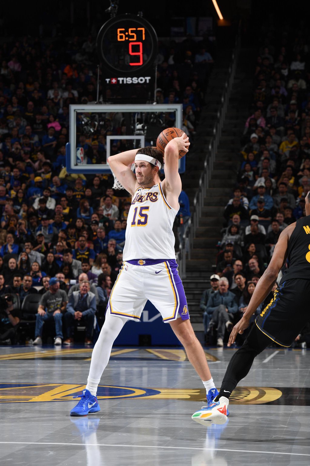Austin Reaves of the Los Angeles Lakers looks to pass against the Golden State Warriors.