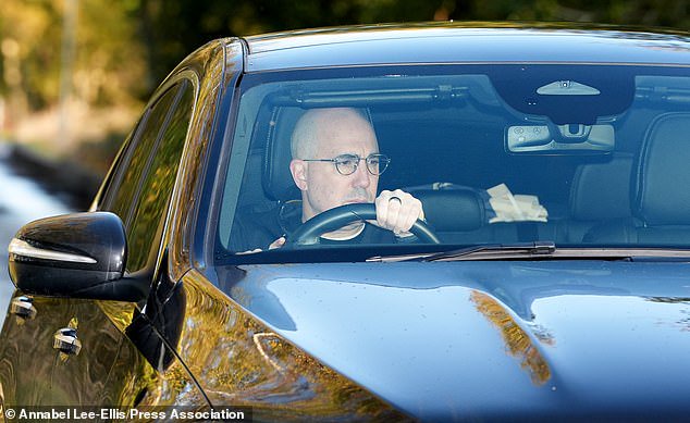 United CEO Omar Berrada is pictured arriving at Carrington with the situation stuck in limbo