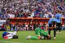 Folarin Balogun of United States and Matt Turner of United States lie on the pitch during the CONMEBOL Copa America 2024 Group C match between Unit...