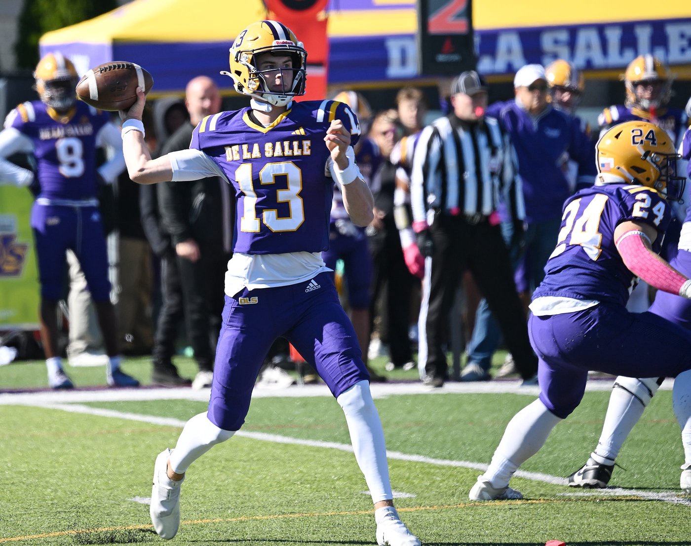 De La SalleÕs QB, Grayson Thurston, passes in the first quarter of a high school football game on October 17, 2026, in Warren, Mich