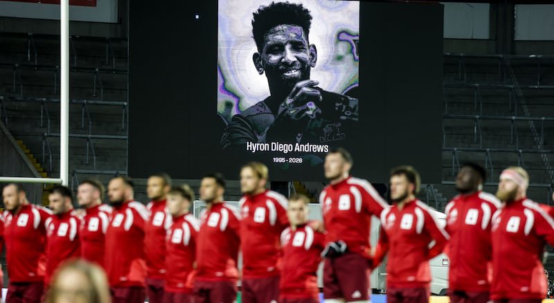 Munster players stand for a minute's silence in memory of Hyron Diego Andrews at Páirc Uí Chaoimh. Photograph: Nick Elliott/Inpho