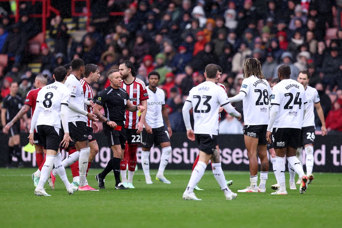 Steve Martin shows a red card to Dion Sanderson of Derby County during the Sky Bet Championship 2026/27 match between Sheffield United and Derby County at Bramall Lane