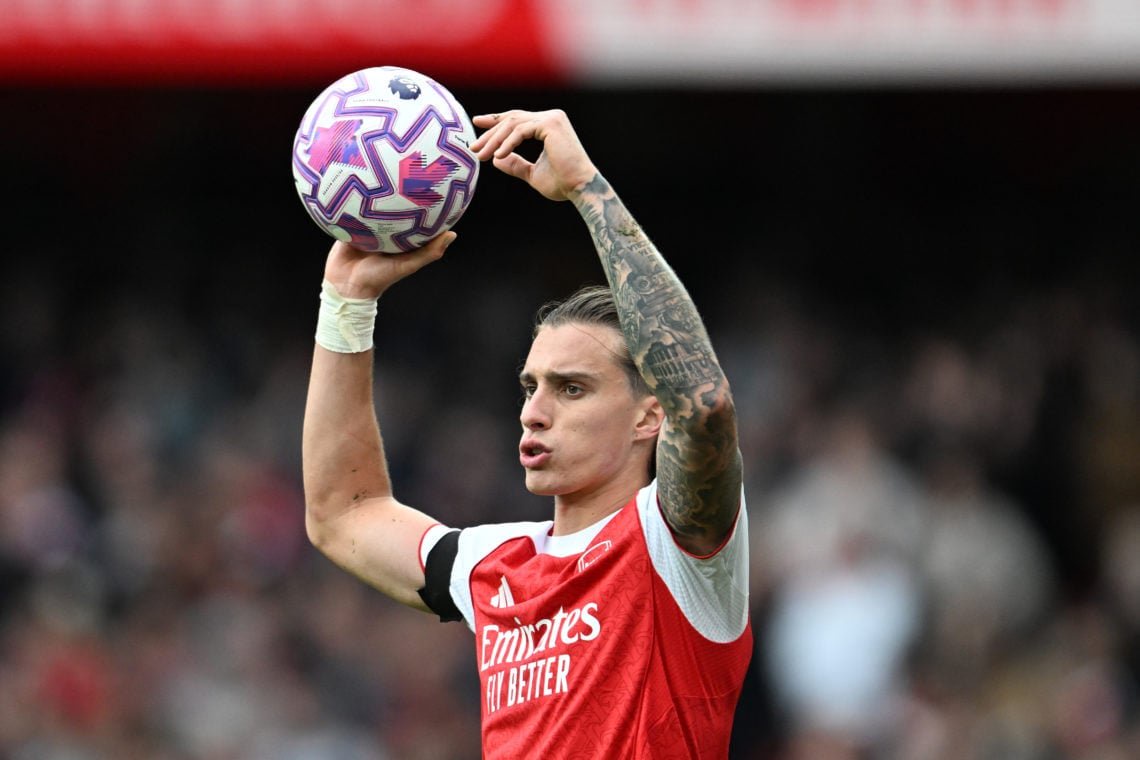 Riccardo Calafiori taking a throw in during an Arsenal game