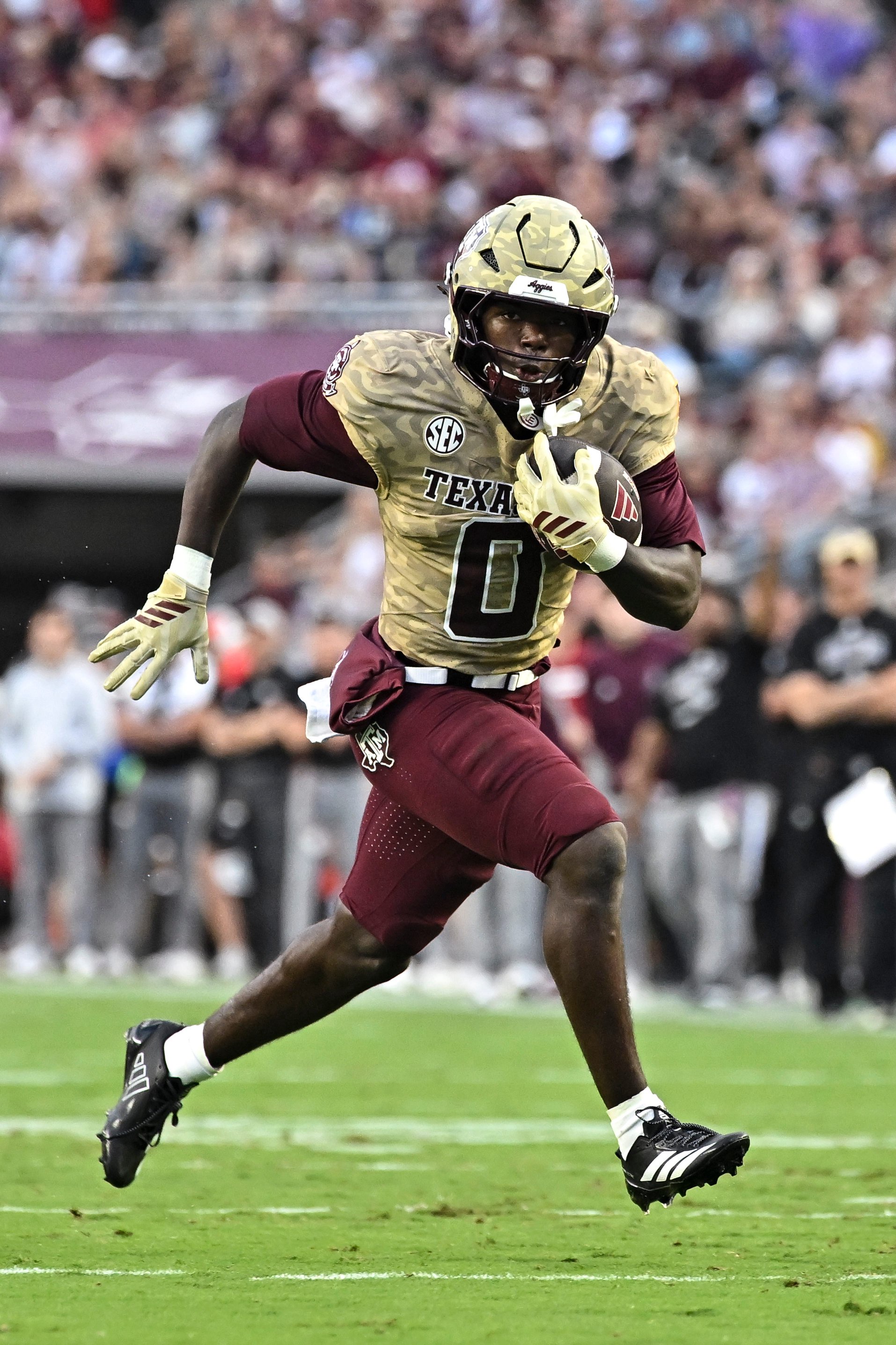 Oct 3, 2026; College Station, Texas, USA; Texas A&amp;M Aggies running back KJ Edwards (0) runs the ball during the first quarter against the Arkansas Razorbacks at Kyle Field. Mandatory Credit: Maria Lysaker-Imagn Images