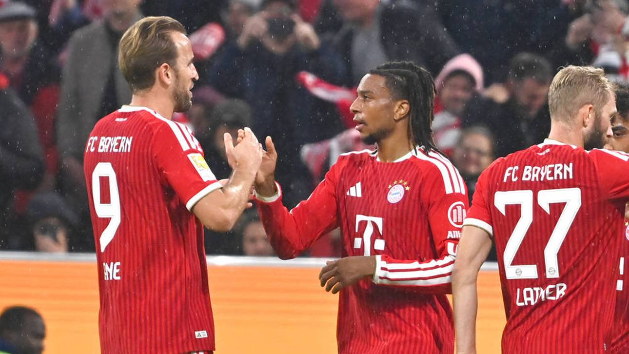 Harry Kane (l.) klatscht mit Michael Olise ab