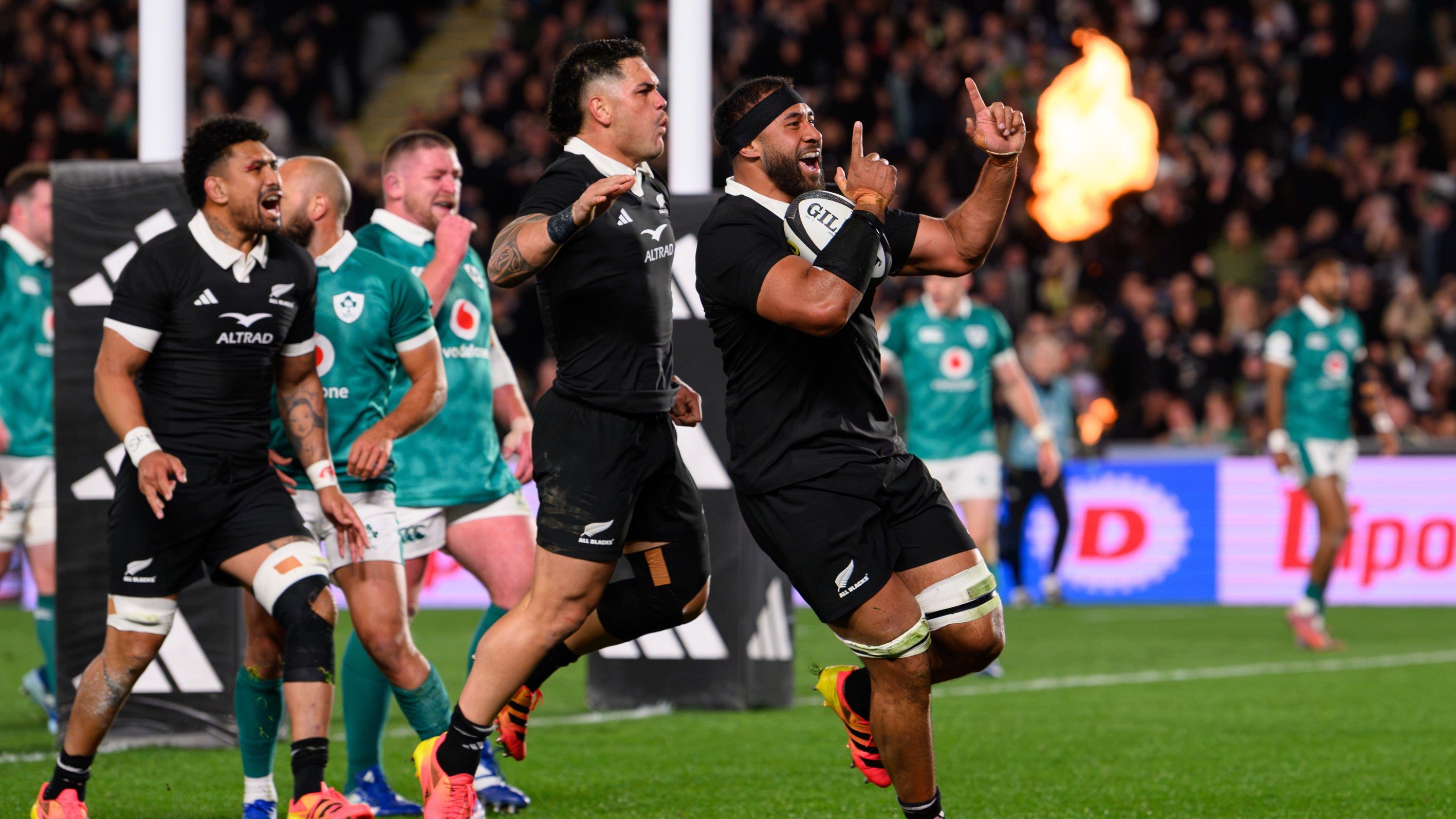 New Zealand celebrate scoring a try against Ireland