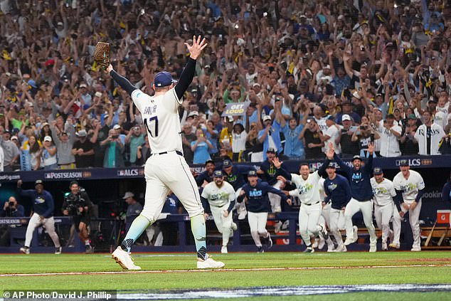 Rays pitcher Bryan Baker celebrates their win against the Guardians at Tropicana Field