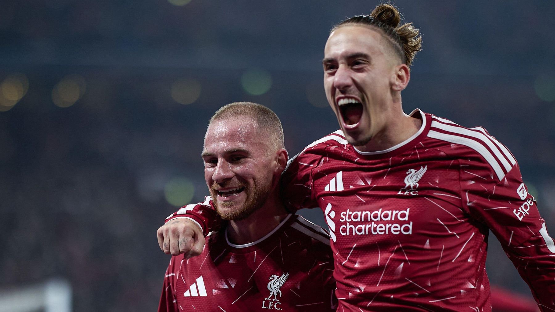 Alexis Mac Allister of Liverpool FC (L) celebrates with Konstantinos Tsimikas
