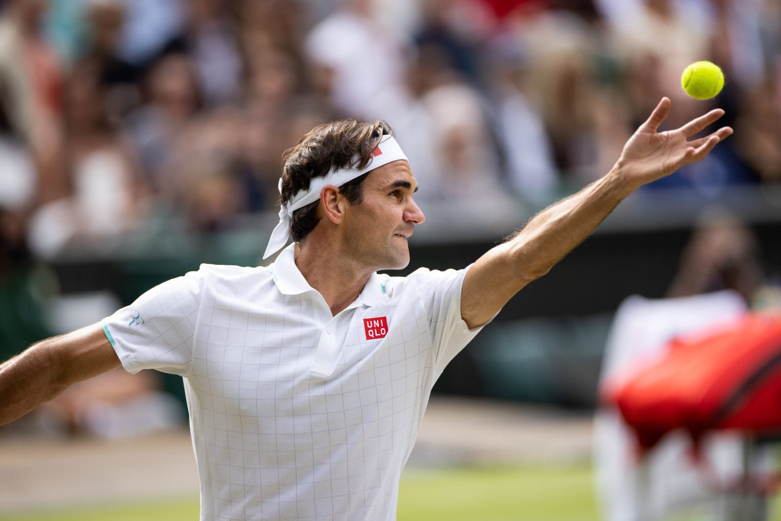 Roger Federer serving.