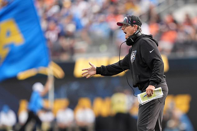 Los Angeles Chargers head coach Jim Harbaugh gestures during the second half of an NFL football game against the Denver Broncos, Sunday, Oct. 11, 2026, in Inglewood, Calif. (AP Photo/Scott Strazzante)