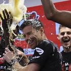 Xabi Alonso drenched in beer by players after Bayer Leverkusen wins first Bundesliga title