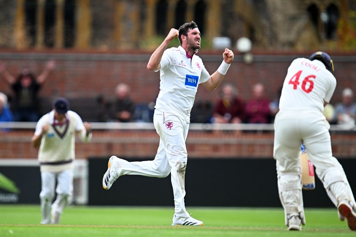 TAUNTON, ENGLAND - SEPTEMBER 02: Craig Overton of Somerset celebrates the wicket of Chris Cooke of Glamorgan during Day One of the Rothesay County Championship Division 1 match between Somerset and Glamorgan at The Cooper Associates County Ground on September 02, 2026 in Taunton, England. (Photo by Harry Trump/Getty Images)
